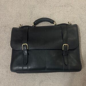 Jack George’s Classic Black Leather satchel with brass hardware